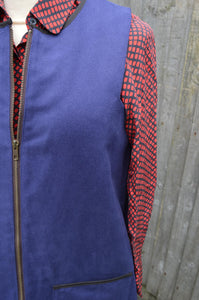zip detail of blue cotton twill working gilet