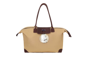 sand coloured canvas and leather weekend bag