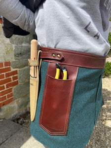 A garden apron and tool belt in one